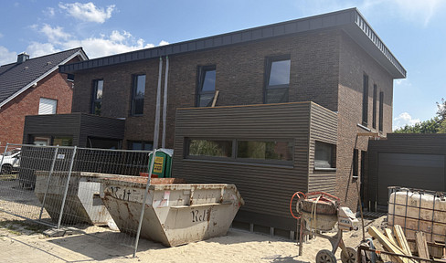 Neubau - hochwertige DHH mit Garten und Garage