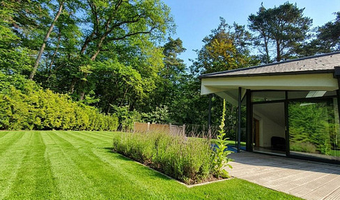 Bright, modern villa on a beautiful plot of land – renovated and available without commission.