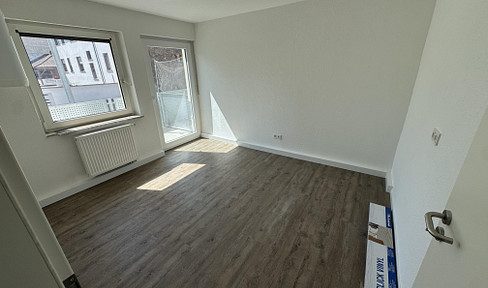 Kernsanierte 1-Zimmer-Wohnung mit großem Balkon – Erstbezug nach Vollsanierung