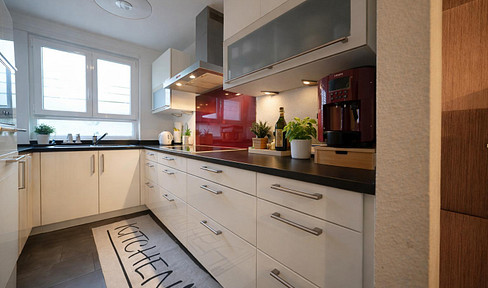 Modern townhouse with garden and double garage.