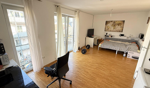 High-quality 1-bedroom apartment with fitted kitchen, large bathroom, and elevator, located in the center of Grafling.