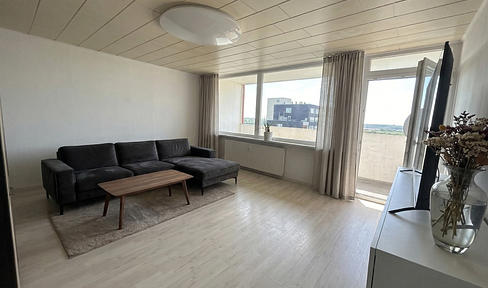 Sunny 3-room apartment with 2 balconies and a distant view, plus a parking space, located in Kerpen.