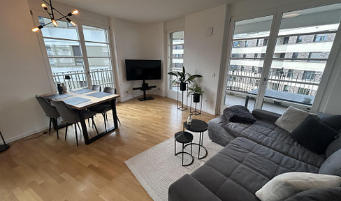 Dreamlike 3-room apartment with 2 bathrooms, fitted kitchen, and a southwest-facing balcony.