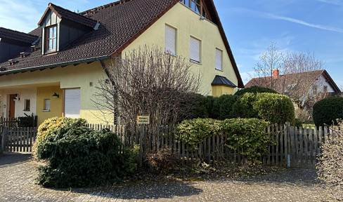 Family-friendly semi-detached house with a garden, sauna, studio, and basement, located in Stegaurach.