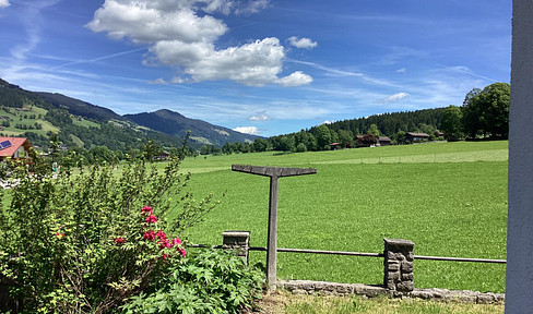 Land.
Plot of land.
Property.
Real estate.
Parcel of land.
Site.
Grounds.
(Depending on the context, other translations might be more appropriate.)