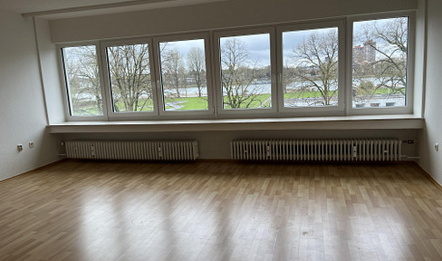 Apartment with exclusive views of the Rhine, plus a private garage and parking space.