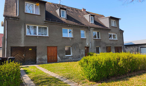 Fully rented 4-family house with 2 garages - well-maintained condition - investment potential (factor of 10).