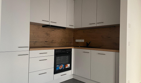 Erstbezug, helle 3 Raum Wohnung, A+ Energie, großer Balkon, geringe NK, Parkett