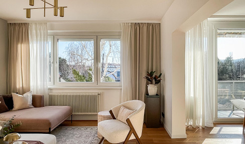 Family dream home in Mauer: 5-room apartment with a balcony, green views, and 2 garages.