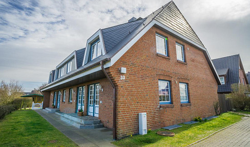 List/Sylt: Charming apartment for sale, located on the upper floor (1st floor) with an additional attic space.