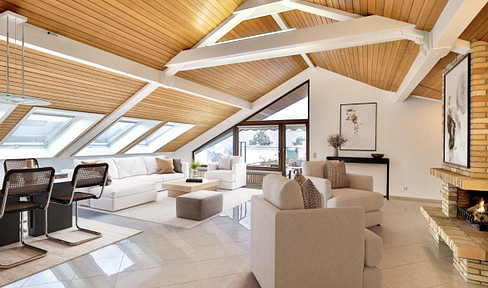 Dreamlike penthouse apartment with 3 rooftop terraces and a fireplace.