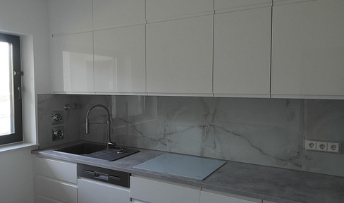 Stylish designer apartment for rent in Saarbrücken, with a garage and partially furnished.