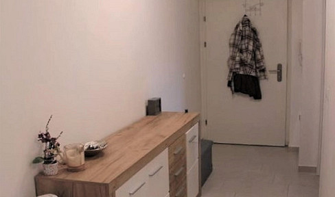 Modern 2-room apartment including a parking space in the underground garage.