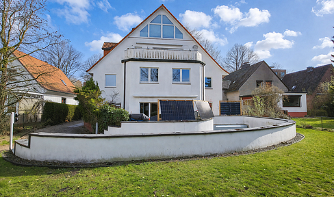 2018 kernsanierte barrierearme Wohnung mit Garten, zwei Terrassen, TG-Stellplatz & neuer Wärmepumpe