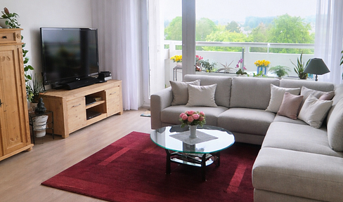 Bright 2-room apartment (69 sqm) with 2 balconies, elevator, and fitted kitchen - €920 per month (including utilities).