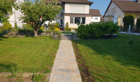 Attractive multi-family house with potential for owner-occupancy and a stable return on investment.