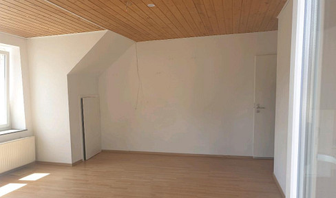 Bright 2-room apartment with balcony on the 2nd floor, 54 m², near the city center.