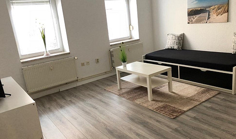 Comfortably furnished ground-floor apartment, "centrally located yet quiet."