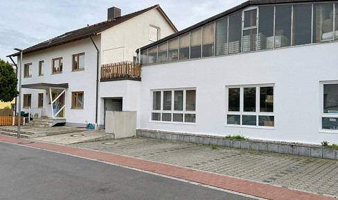 Prime corner lot with existing building and development potential.