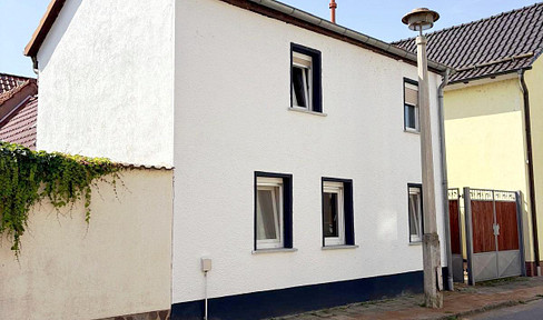 Renovated detached house with garage – available immediately – only €65,000.