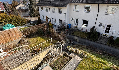 Well-maintained terraced house with a garage, parking space, and garden in Balingen.