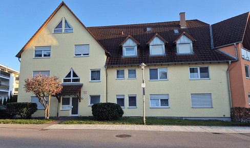 Modern 2-room apartment with balcony, underground parking space, and excellent location.