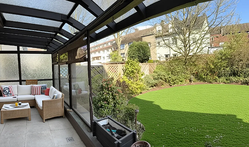 City apartment with a garden, garage, and wellness area.