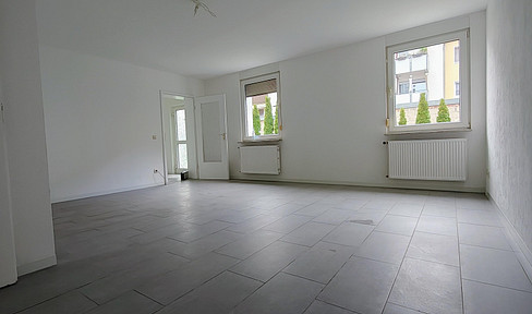 Wohnung im EG mit Terrasse und Gartenzugang