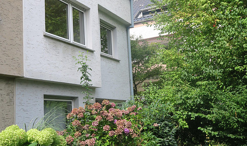Terraced house with garage.