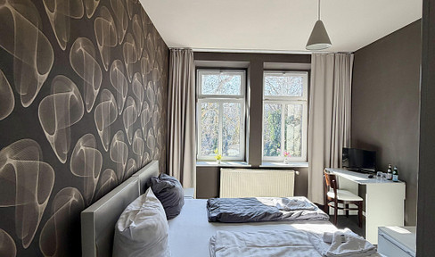 2-room apartment in a historic building with 2 bathrooms (ideal for shared living).