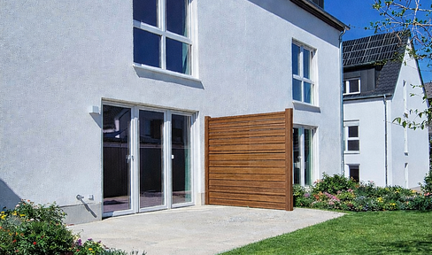 New construction townhouse with terrace – 140 m² family home with very low energy costs (energy efficiency class 40 + photovoltaic system).