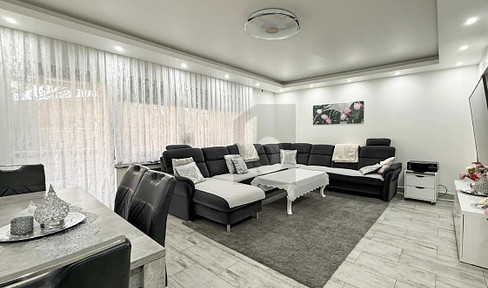 Well-maintained apartment building with three residential units.