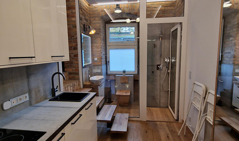 Commercially zoned unit with residential-style amenities.