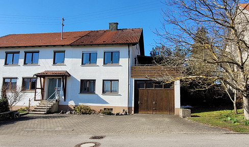 Spacious two-family house: Enjoy rural living with plenty of potential for renovation and development, while still being close to the city.