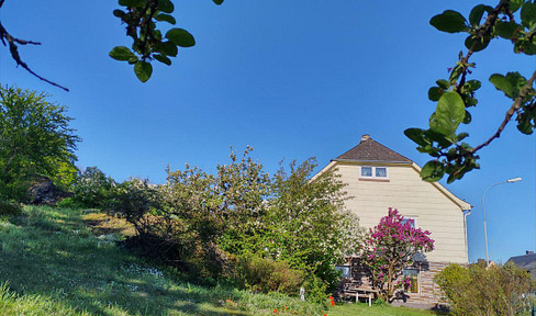 Living with unobstructed, expansive views of the surrounding greenery.