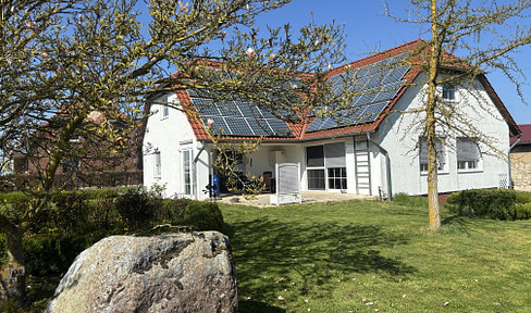 Detached house on a large plot of land.