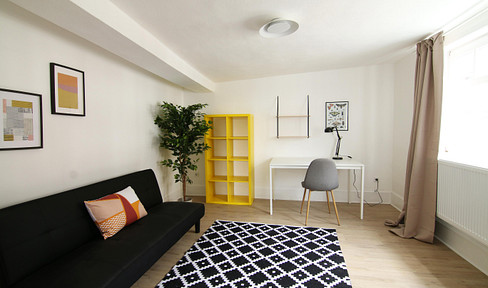 Stilvolle 2,5-Zimmer-Wohnung im Altbau – möbliert & gemütlich