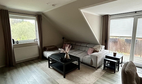 Modernized 3-room apartment with an additional, renovated attic space.