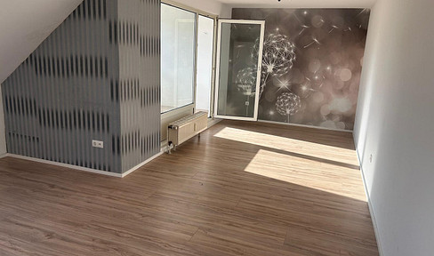 Bright, modern attic apartment in Bornheim-Waldorf.