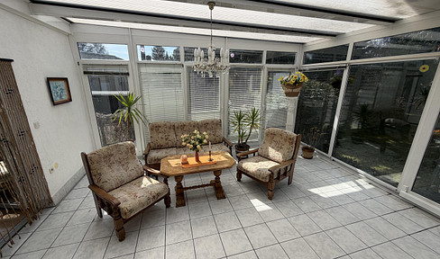 Single-family house in a bungalow style, with a separate apartment.