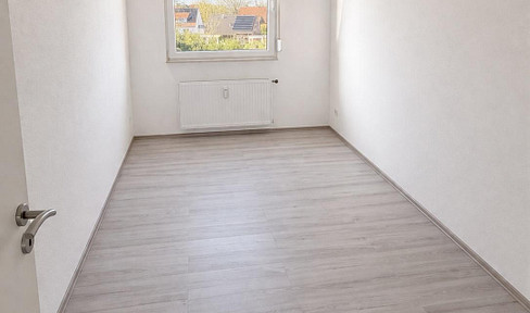 Spacious 4-room apartment available without any required references, with a parking space, located in Buldern.
