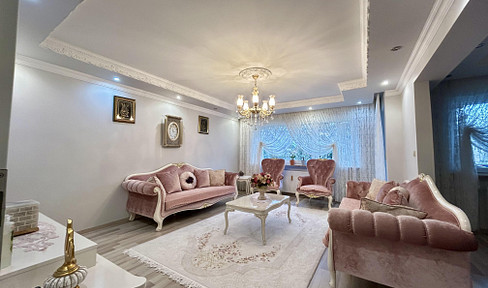 Einziehen und wohlfühlen: 4,5-Zimmer-ETW mit Wintergarten, Gartenanteil & Garage - provisionsfrei