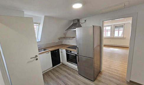 Cozy 1-room attic apartment with 33m² of living space in Friedberg.