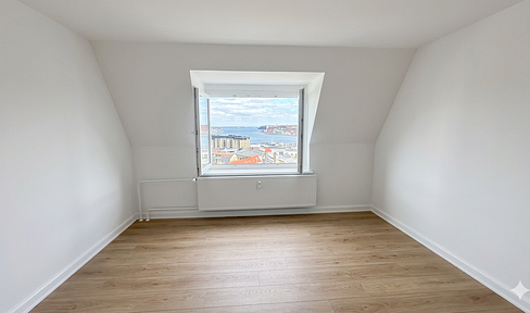 Renovated attic apartment with a view of the fjord.