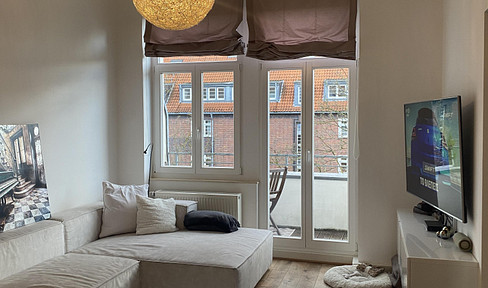 Stylish living with historical charm in a renovated pre-war building.