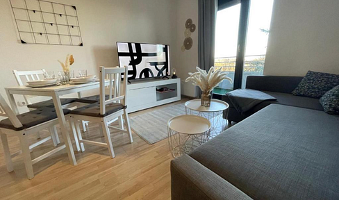 Fully furnished 49 m² apartment with a balcony, elevator, fitted kitchen, swimming pool/sauna, and an optional underground parking space.