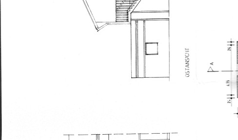 Property with a house, storage building, and workshop.
