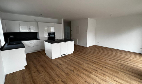 Letzte Neubauwohnung mit hochwertiger Einbauküche, 2 Tiefgaragenplätzen & ca. 4,4 % Nettorendite
