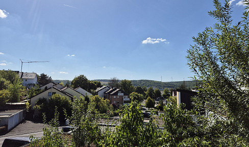 Spacious terraced house with a separate apartment, garden, fireplace, and sauna.