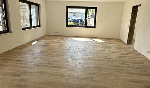 First occupancy after complete renovation: Ground floor apartment with 2 rooms, kitchen, and bathroom, featuring high-quality finishes and including a parking space.